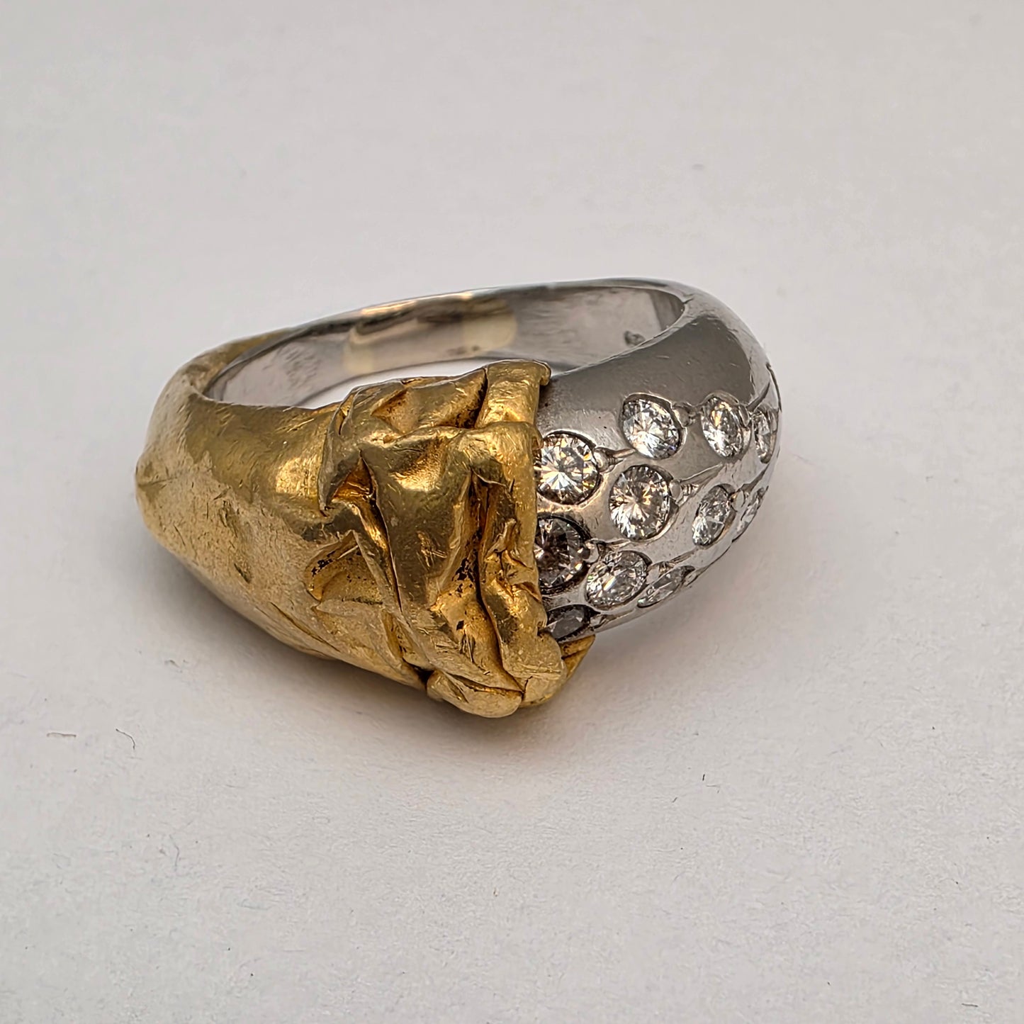 Diamantni prstan "BOND" 18K 750/1000 + Pt 950 + DIA; masa=14.10g