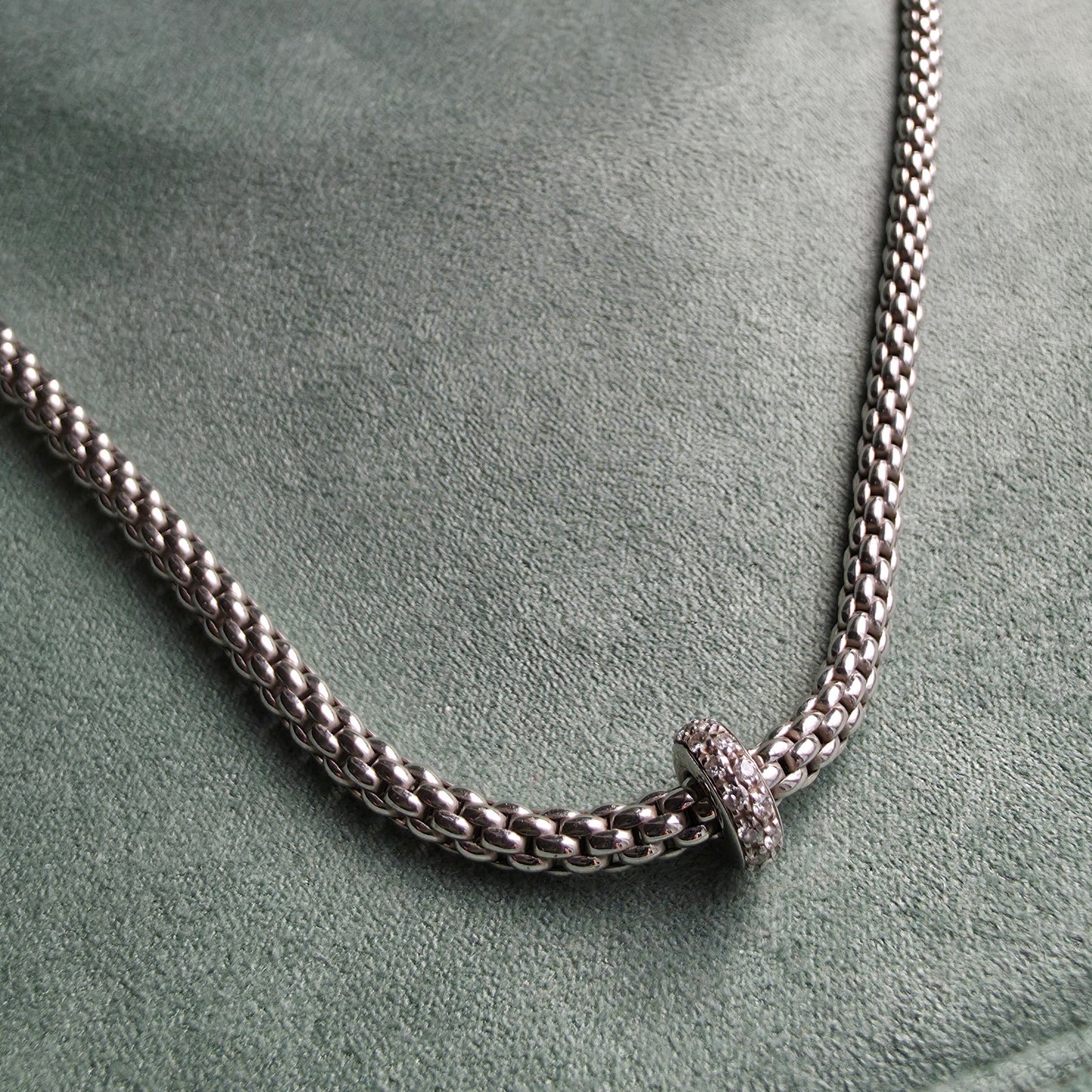 Zlata verižica "FOPE" 18K 750/1000+DIA; masa=16.13g